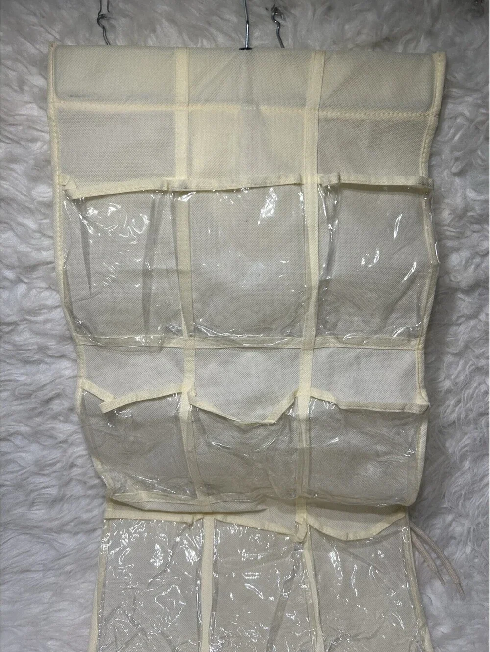 biege multi-pocket hanging closet organizer